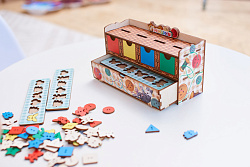 Дидактическая игра "Волшебный комодик "Пуговки"